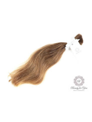 Polish virgin hair in a shade of light brown with a length of 32 cm and a weight of 25 grams